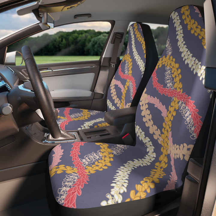 the interior of a car with colorful Hawaiian flower lei floral patterned seat covers