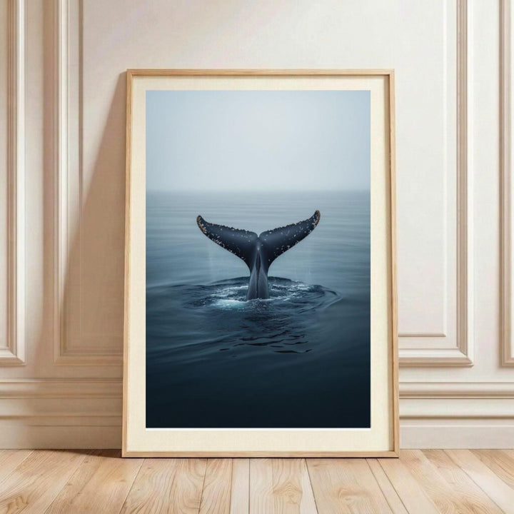 Minimalist watercolor painting of a humpback whale tail fluke rising from the water, textured blue and teal ocean art on white background, modern coastal wall decor.