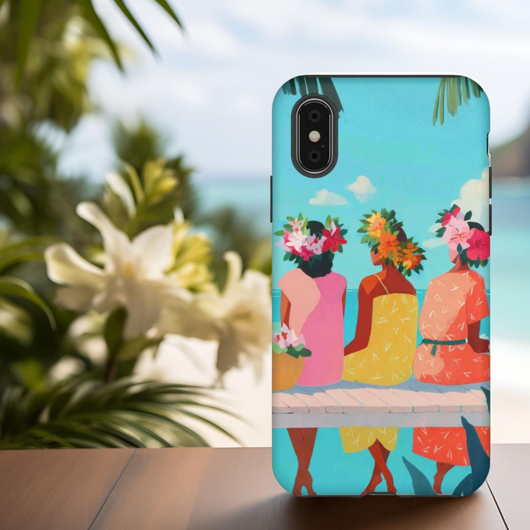 a colorful phone case with a tropical beach scene, including three women wearing flower crowns and sitting on a bench overlooking the ocean.