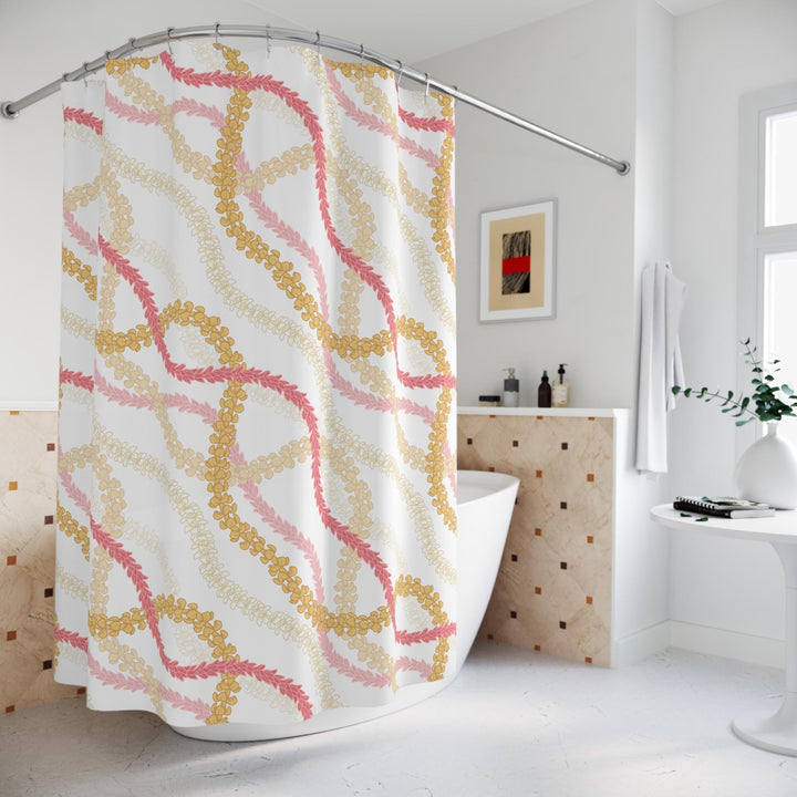 A shower curtain featuring a Hawaiian flower lei floral pattern in shades of pink and yellow.