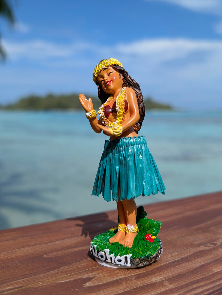 4-inch hand-painted hula girl figurine on tropical beach scene