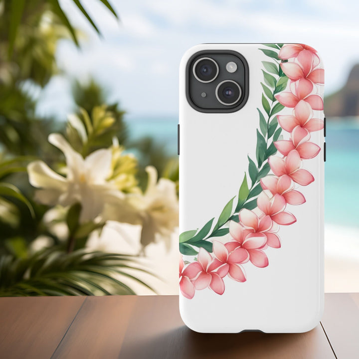 A white phone case with a floral design featuring pink plumeria flowers and green leaves in a lei style