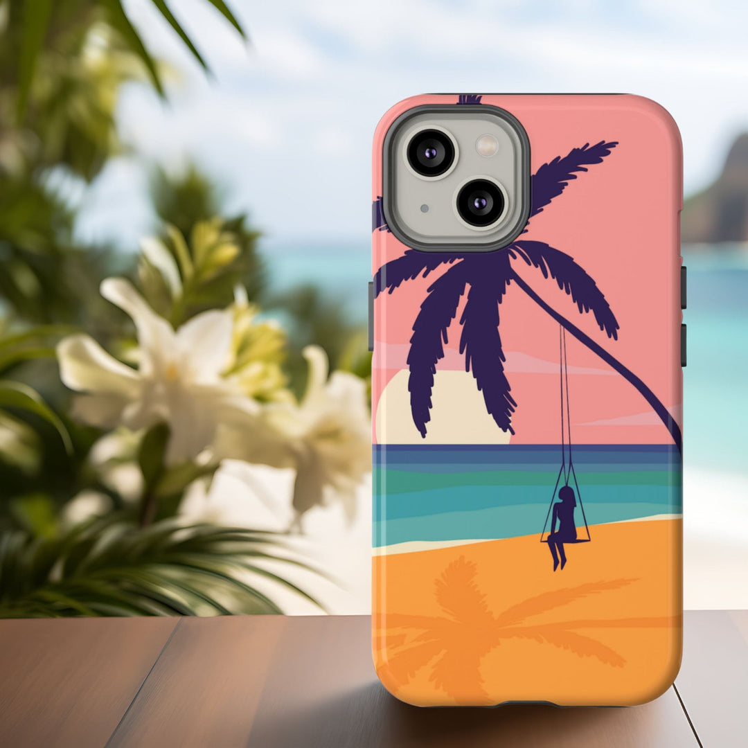 a phone case with a beach scene design, including a palm tree, a person on a swing, and a sunset over the ocean.