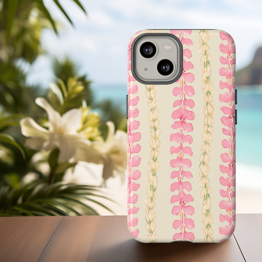 a phone case with a Hawaiian flower lei floral pattern in pink and cream colours.