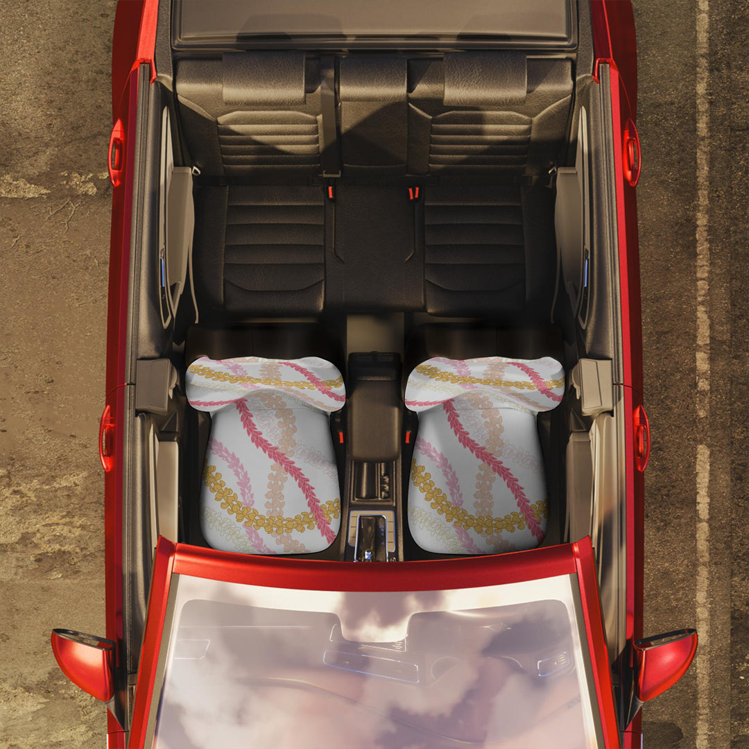 Pair of Little Aloha Co car seat covers in coordinating Hanalei Bay flower lei print